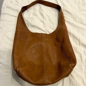 Lucky handbag genuine leather.  Gorgeous brown neutral color!